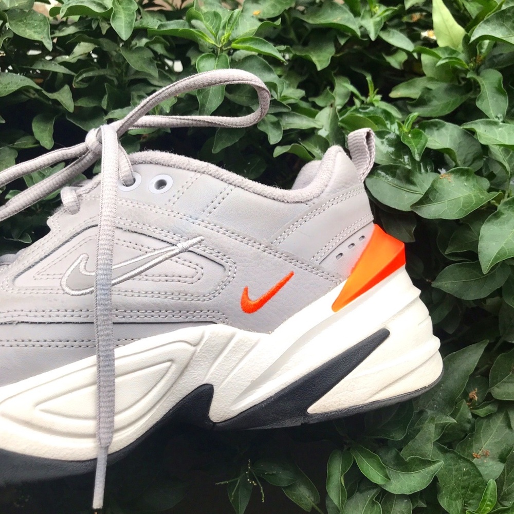 Nike m2k tekno sneakers in a grey, neon orange, and white colorway